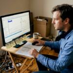 Trader configuring MT5 in a home office