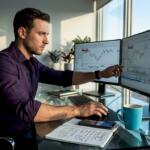 Forex trader configuring MT5 at home desk